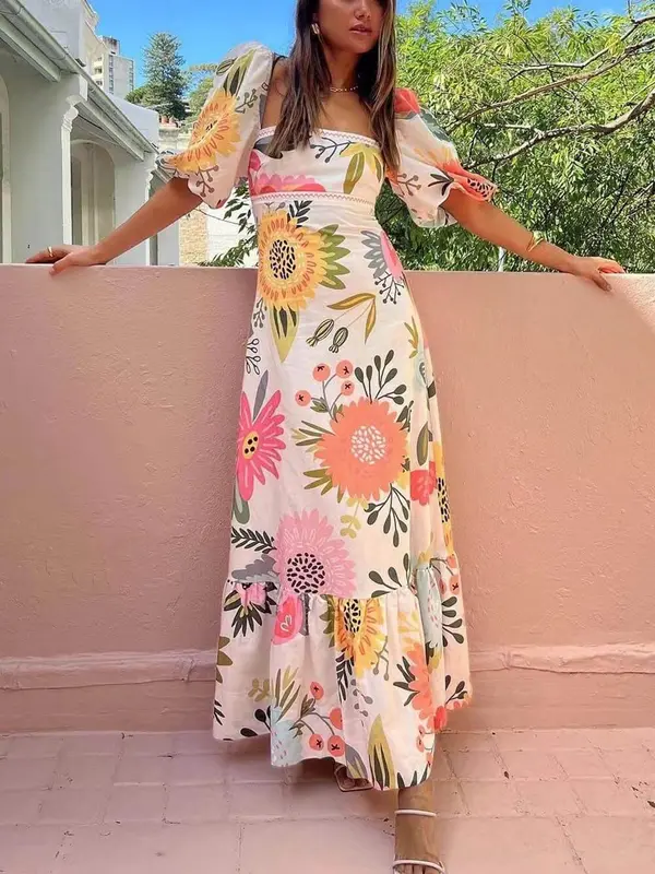 Cleo - Robe longue élégante à imprimé floral