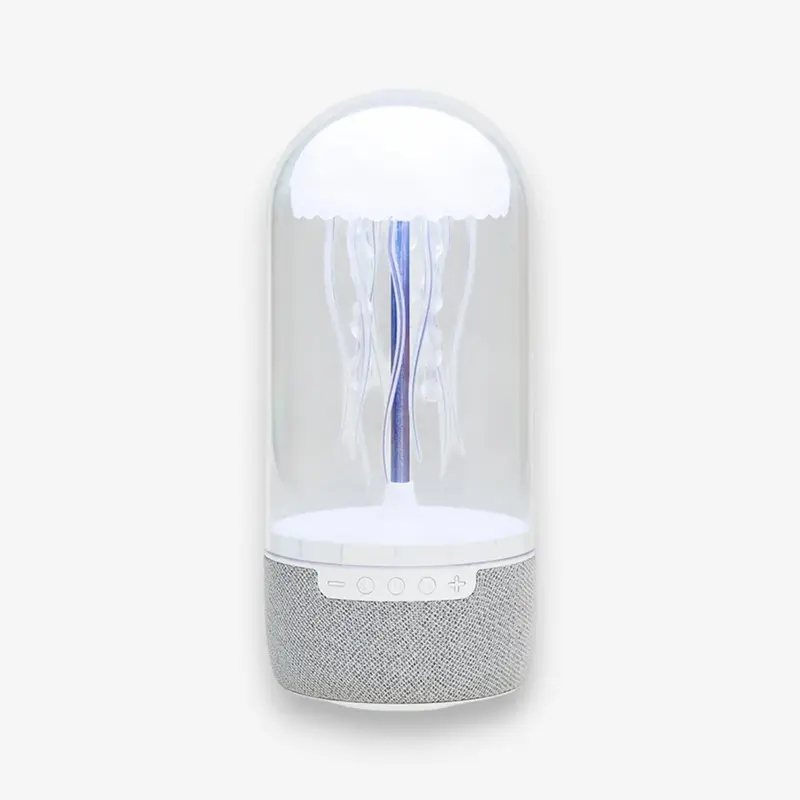 Lampe méduse LED rotative sur table