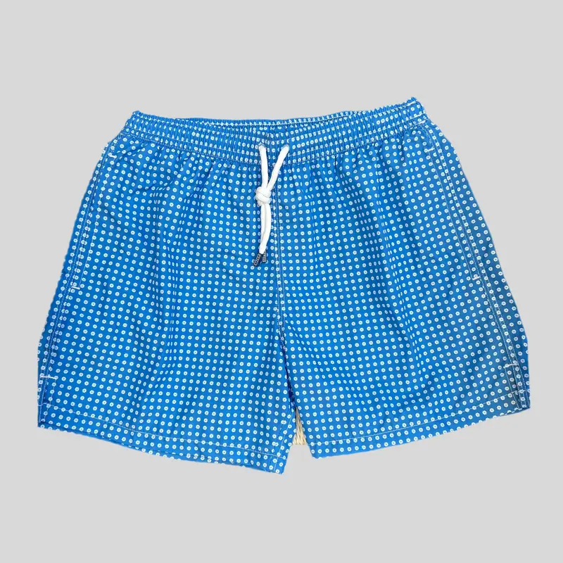 Maillot de bain bleu clair motif fleurs blanches