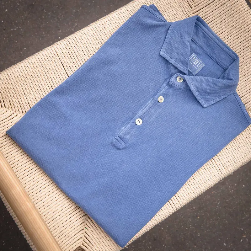 Polo manches courtes piqué de coton bleu jean