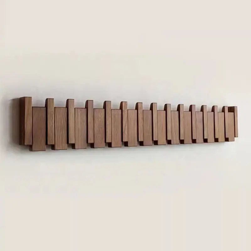 Support mural crochets pliables cachés style piano