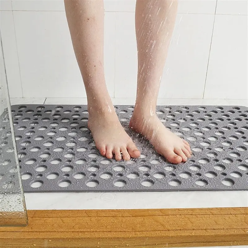 Tapis de douche antidérapant avec drainage efficace